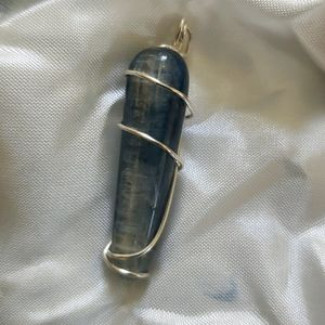 Handmade unique dichroic glass pendant wire wrapped. 1 1/4 inch long.